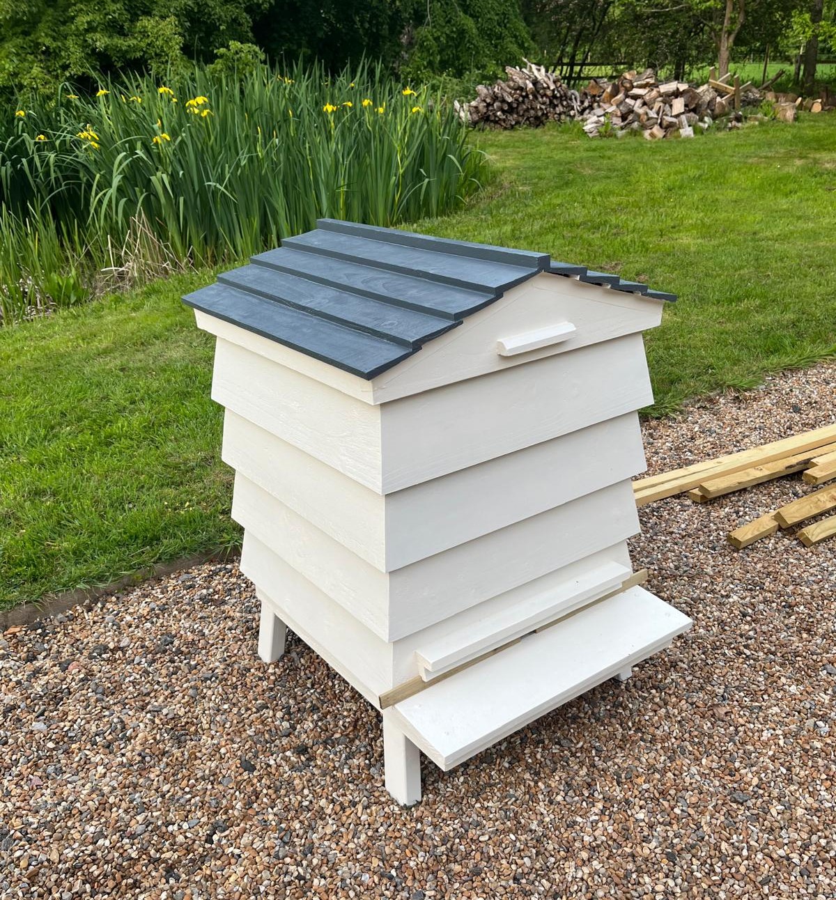 Bee Tidy timber hive form suitable for raised and bespoke garden storage orders