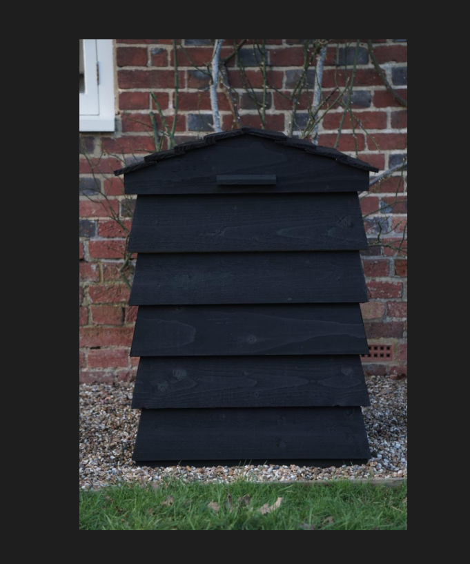 Parcel Drop Box showing its weatherproof timber hive profile