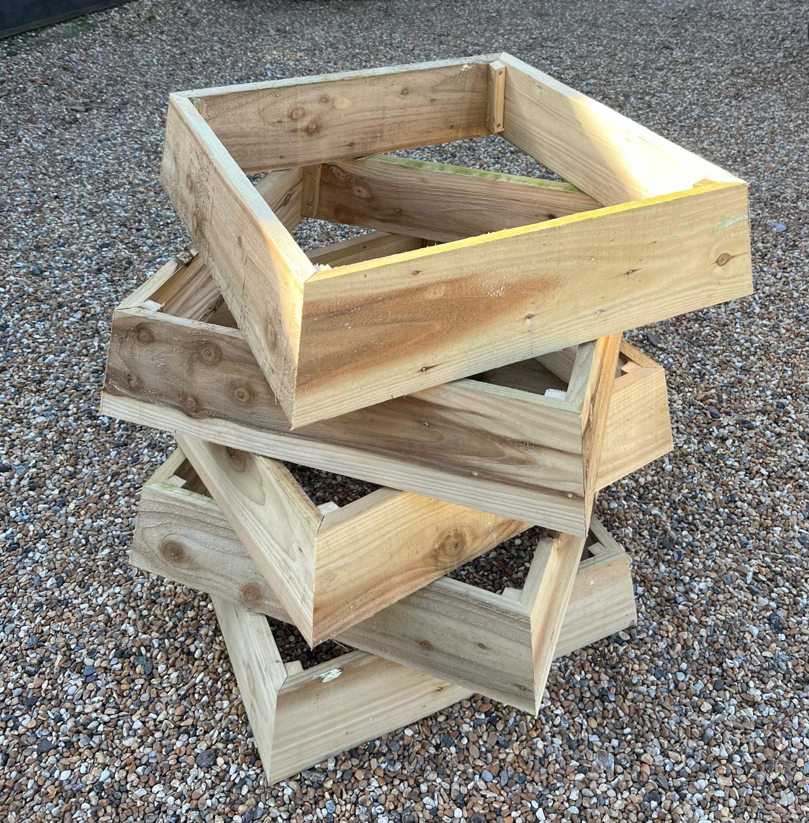 Selected Bee Tidy timber showing natural board character near the workshop